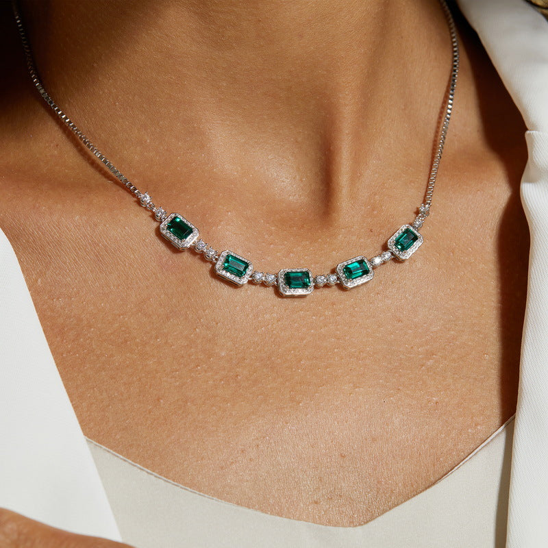 Origsoul necklace with choker featuring green gemstones and silver chain on model