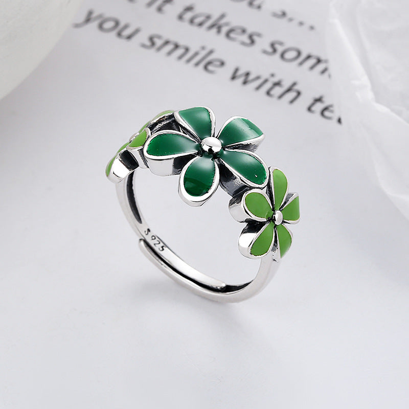 Origsoul October birth flower ring with green enamel floral design on sterling silver band