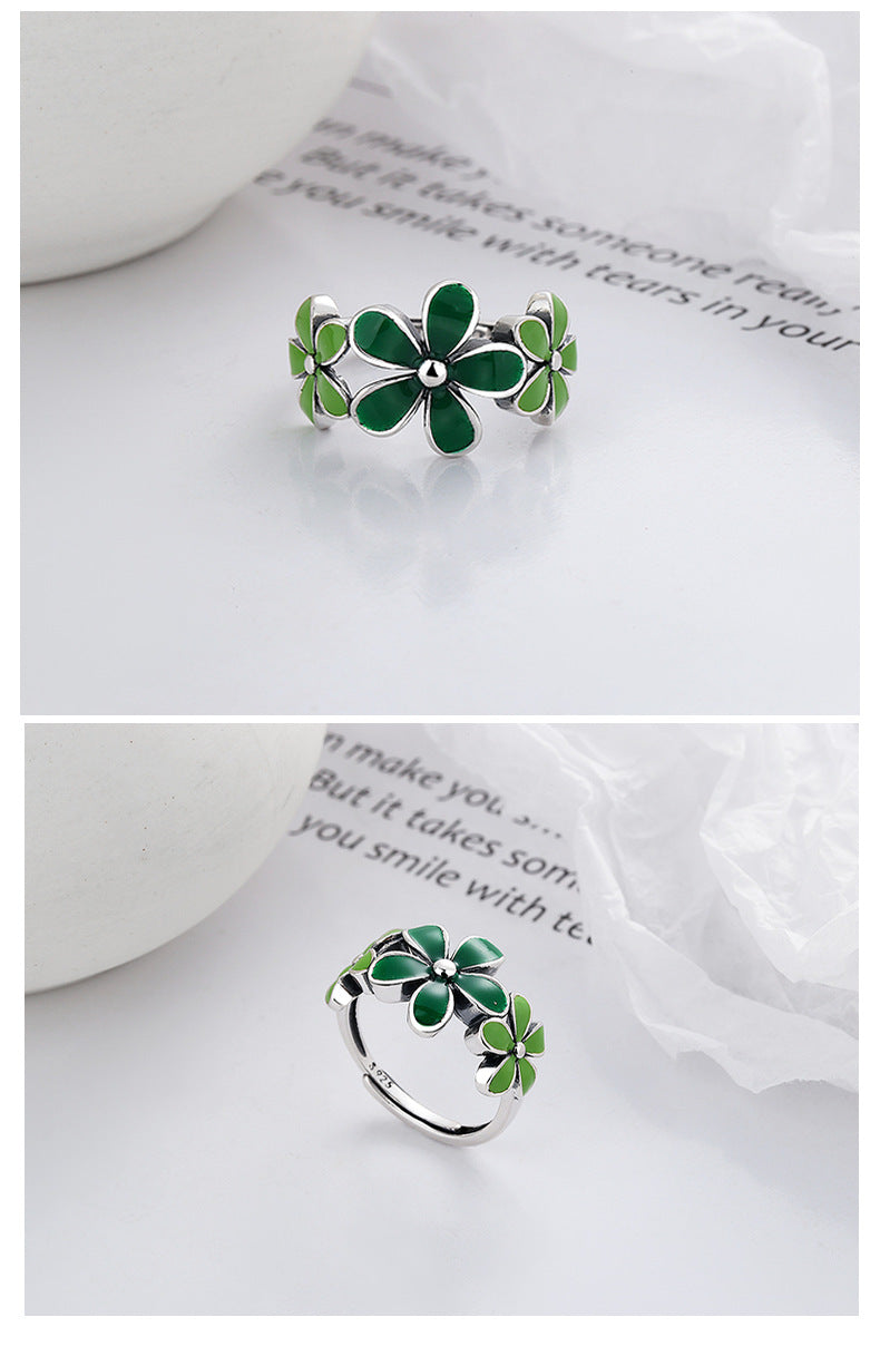 Origsoul October birth flower ring with green enamel floral design on silver band