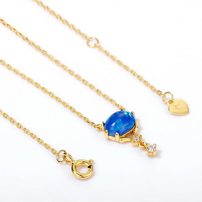 Origsoul gold chain opal necklace birthstone with blue opal and small clear stones pendant