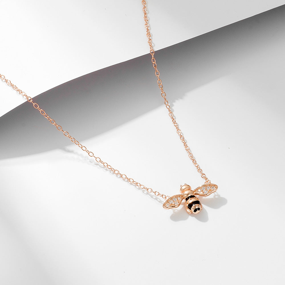 Origsoul insect jewelry featuring a bee pendant necklace with painted oil drop jewelry design
