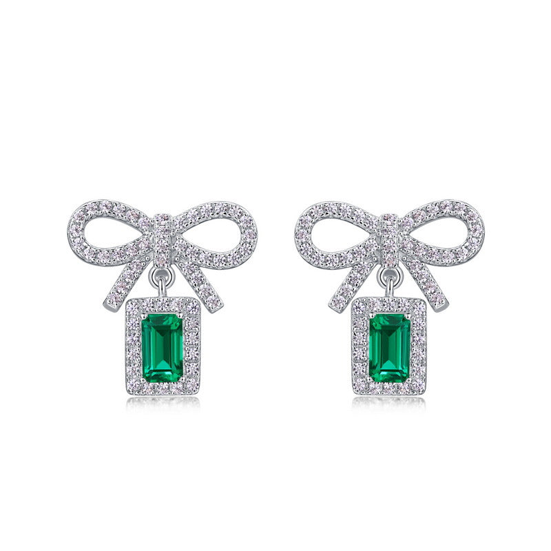 Origsoul silver sterling silver earrings with bow design and green rectangular gemstones