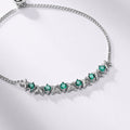 Origsoul sterling silver pandora bracelet with green gemstone and butterfly design accents