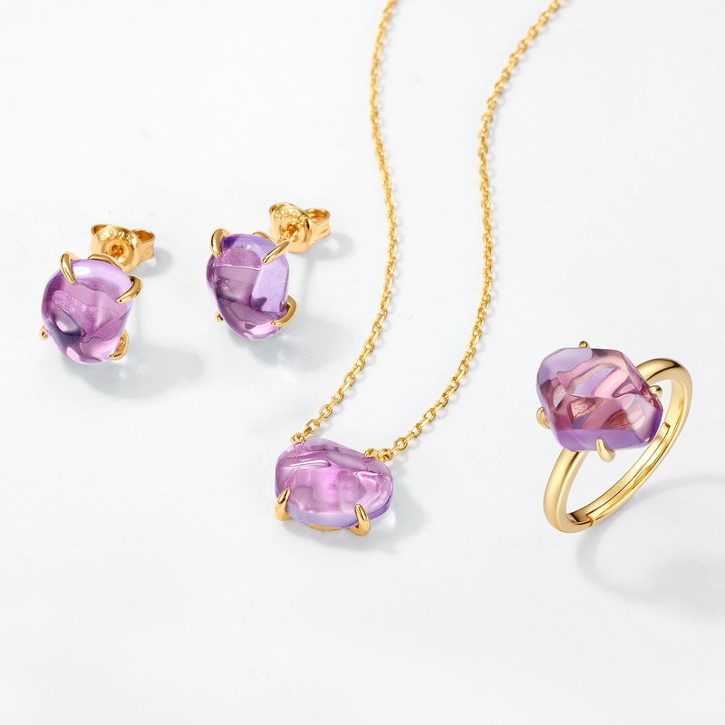 Origsoul pendant in sterling silver with purple gemstone set in gold-tone jewelry set including necklace earrings and ring