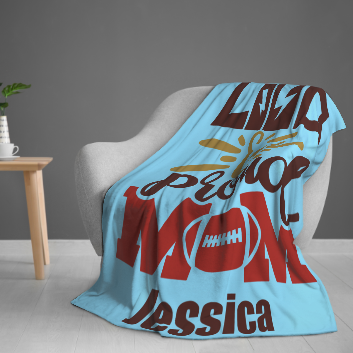 Origsoul personalized 280g cozy throw blanket in blue with custom text draped over gray chair