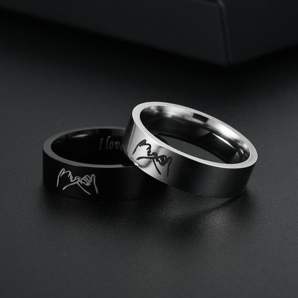 Origsoul personalized couples ring set with black and silver bands engraved with pinky promise design