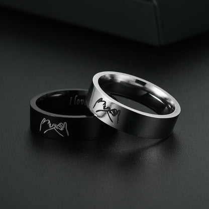 Origsoul personalized couples ring set with black and silver bands engraved with pinky promise design