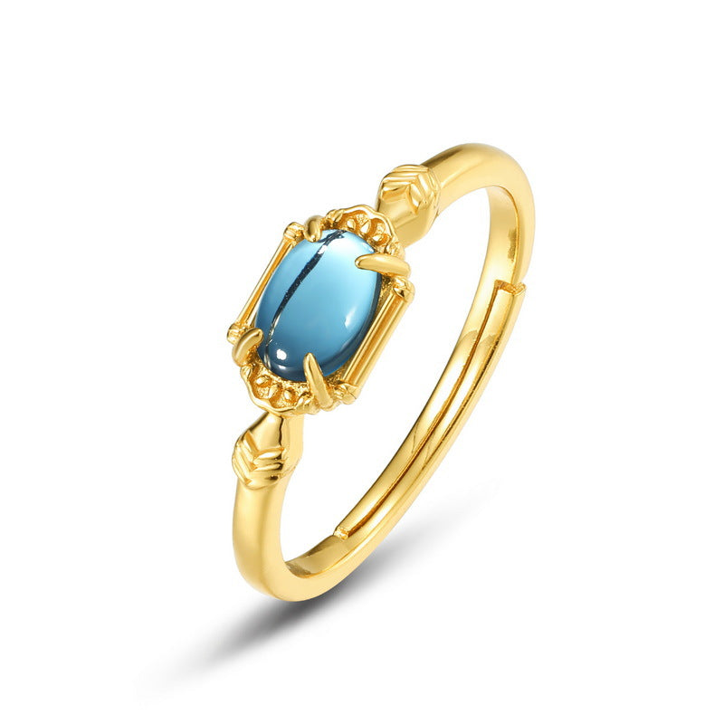 Origsoul ring sterling silver gold plated band with blue oval gemstone centerpiece