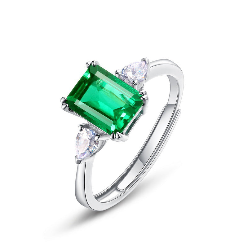 Origsoul ring sterling silver with emerald green center stone and two pear-shaped clear crystals