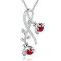 S925 ladybug vine necklace featuring sparkling red stones and a delicate leaf design