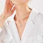 Elegant S925 ladybug vine necklace worn by a model in a white shirt, showcasing its delicate design