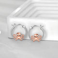 S925 sterling silver marine life earrings featuring a cute octopus design with rose gold accents
