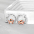 S925 sterling silver marine life earrings featuring a cute octopus design with rose gold accents