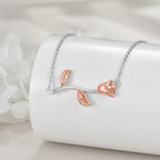 Origsoul S925 sterling silver rose necklace with a delicate floral design and rose gold accents