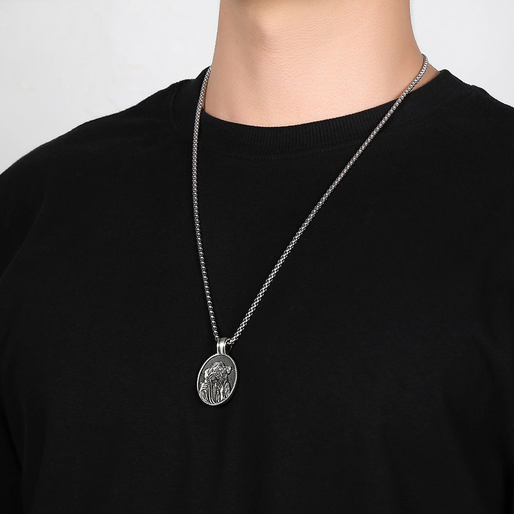 Tranquil Spirit Collection Shepherd Jesus pendant necklace on a person wearing a black shirt