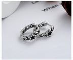 Origsoul cosmic jewelry twisted style earrings for women featuring star design in silver tone