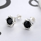 Origsoul cosmic star stud earrings with black gemstone set in silver metal design