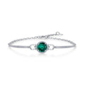 Origsoul delicate silver bracelet with emerald centerpiece and small crystal accents