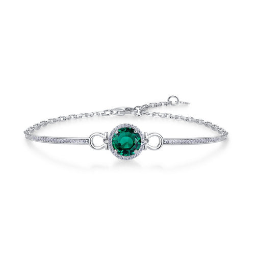 Origsoul delicate silver bracelet with emerald centerpiece and small crystal accents