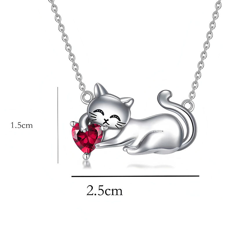 Origsoul silver cat necklace with a playful cat holding a red heart pendant on a delicate chain