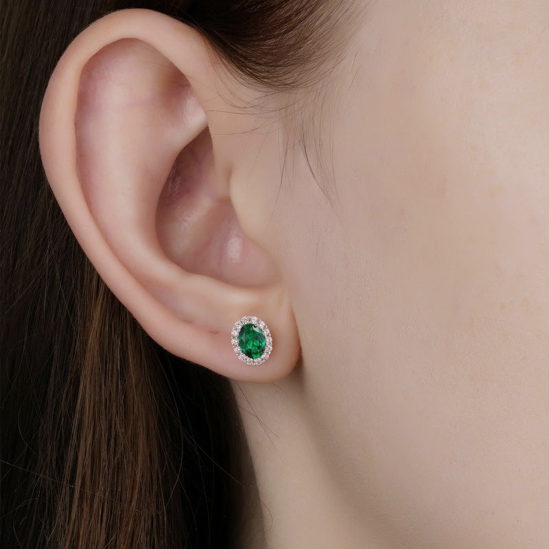 Origsoul silver earrings sterling with green gemstone and halo design on ear
