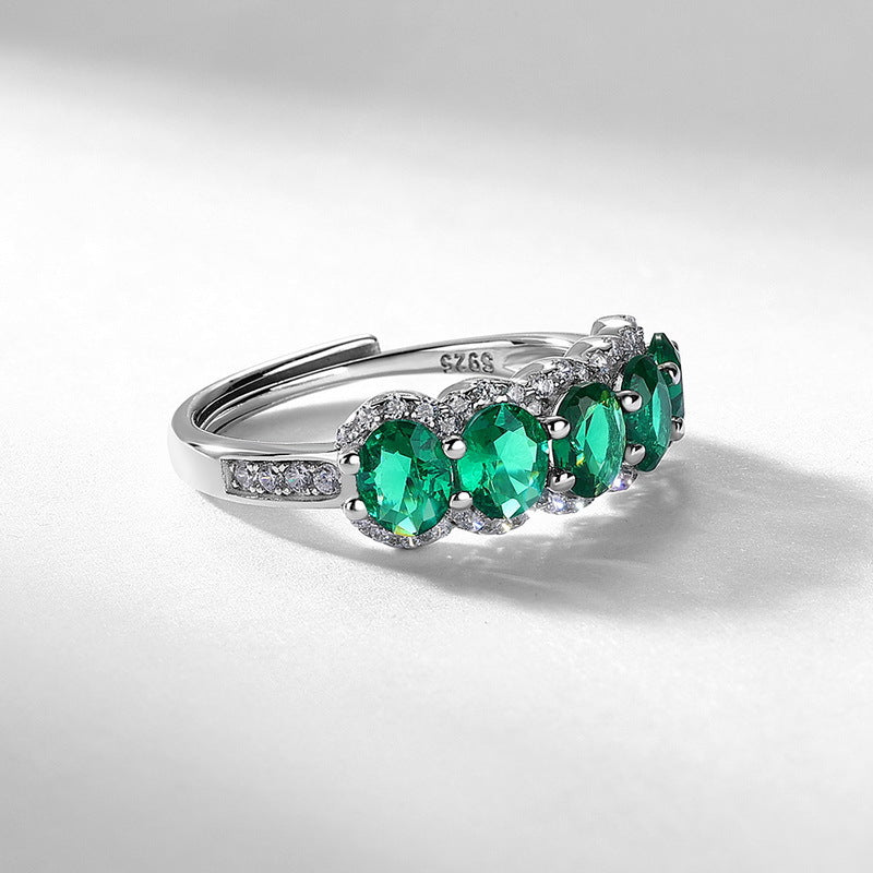 Origsoul engagement ring emerald cut with multiple oval green gemstones and diamond accents