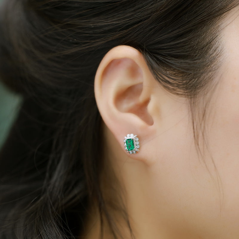 Origsoul silver hoop earrings sterling silver with green gemstone and small clear stones on ear