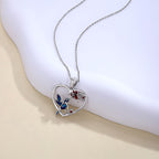 Origsoul hummingbird heart pendant necklace with silver chain and colorful hummingbird detail