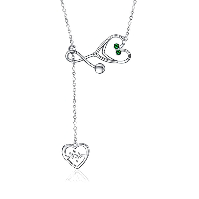 Origsoul infinity heart stethoscope necklace in silver with green gems and heart heartbeat pendant