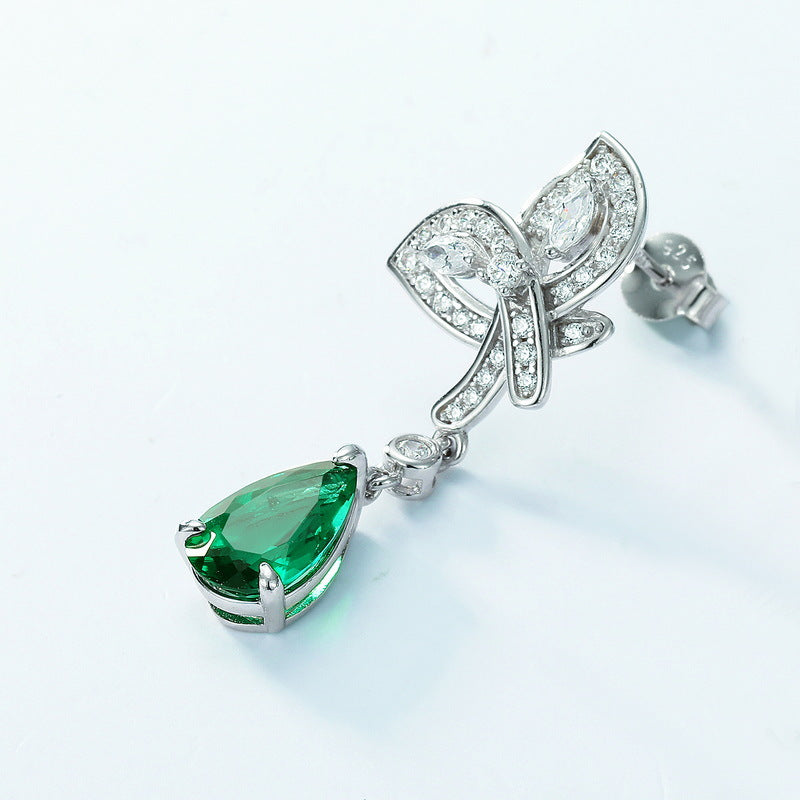Origsoul elegant dangling earring featuring lab-grown emerald rings and sparkling white stones in silver setting