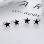 Origsoul cosmic jewelry nautical star stud earrings in silver with black enamel detailing