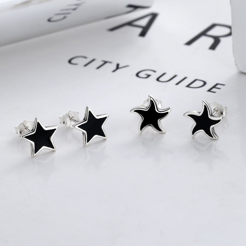 Origsoul cosmic jewelry nautical star stud earrings in silver with black enamel detailing