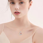 Origsoul silver rose heart pendant necklace worn by woman with light skin and neutral top