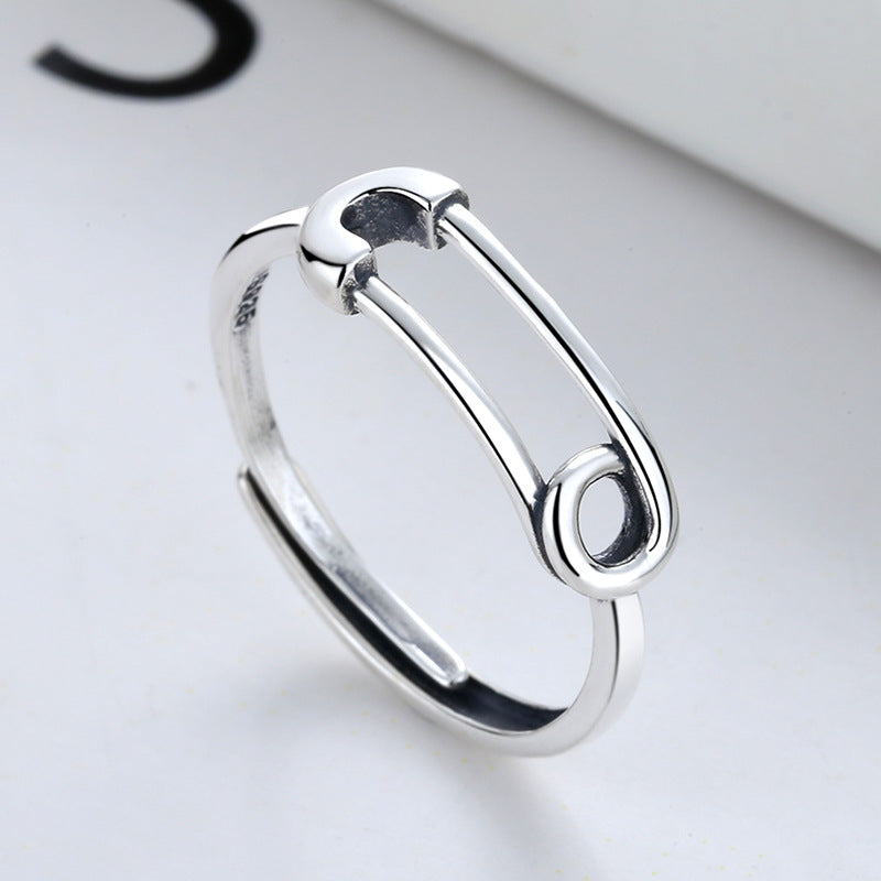 Origsoul silver safety pin ring with sleek and minimalist design in polished silver finish