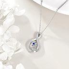 Origsoul elegant silver September birthstone necklace with blue gemstone and floral design pendant