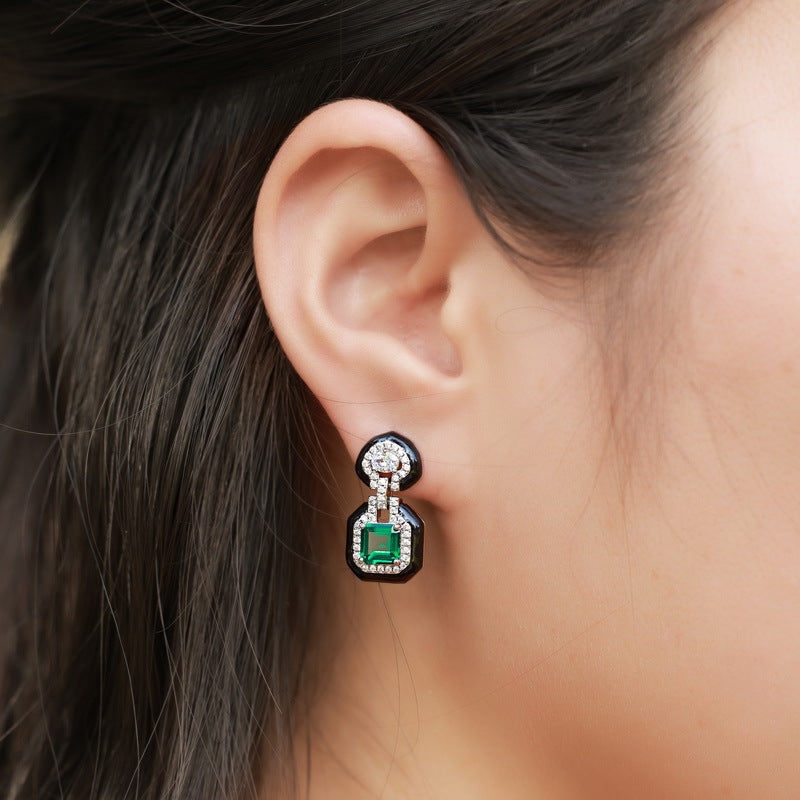 Origsoul silver sterling jewellery emerald and diamond drop earrings on ear