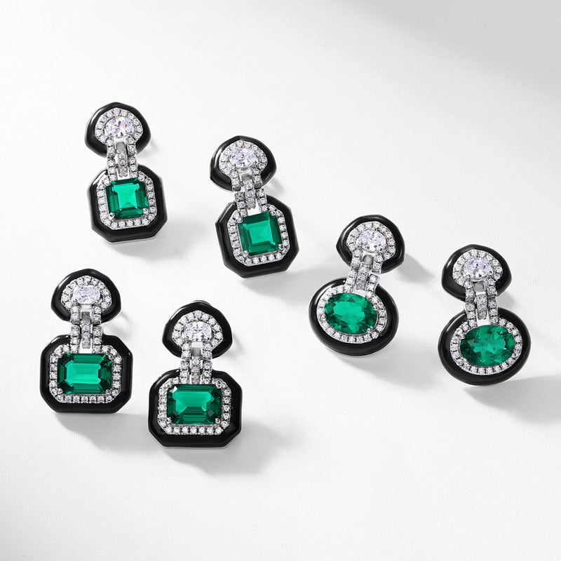 Origsoul silver sterling jewellery featuring elegant emerald green and clear crystal stud earrings
