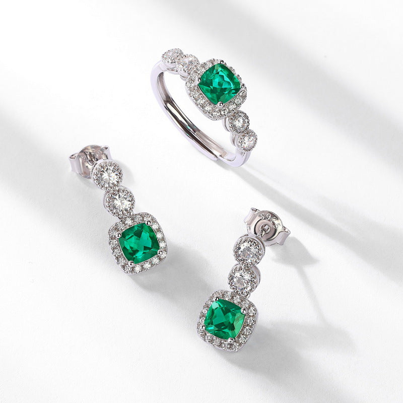 Origsoul silver sterling ring and matching earrings with green gemstones and sparkling accents