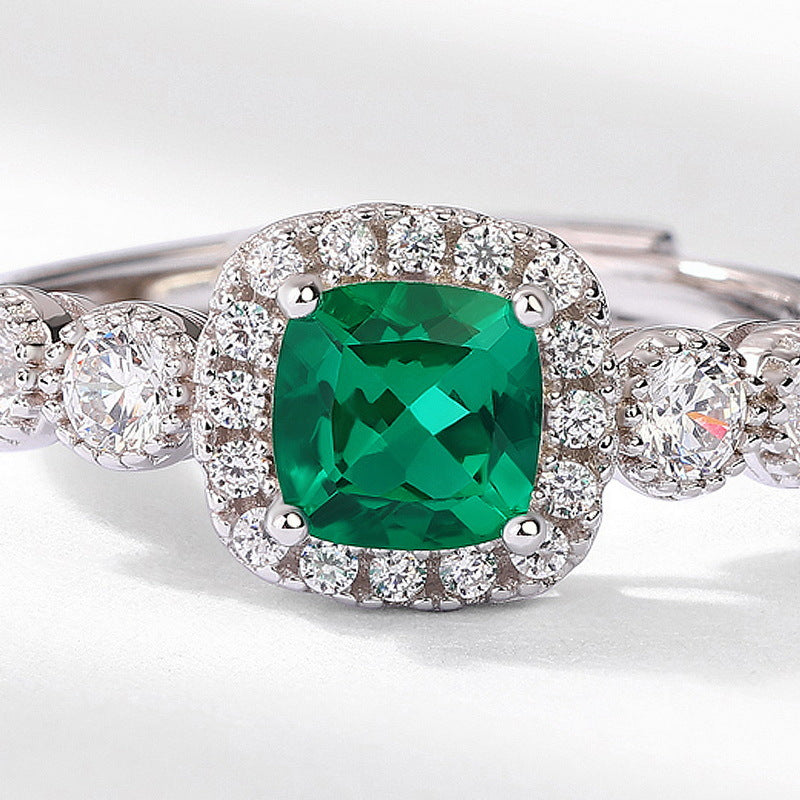 Origsoul silver sterling ring with a square green gemstone and surrounding small clear stones