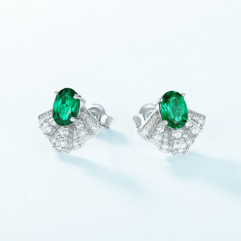 Origsoul silver sterling silver earrings with green oval gemstones and surrounding clear crystals