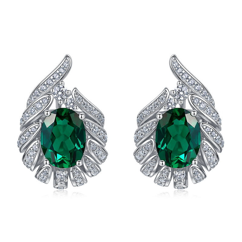 Origsoul silver sterling silver earrings with green oval gemstones and intricate crystal accents