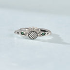 Origsoul sunflower antique ring in silver with green gemstone accents on a delicate band