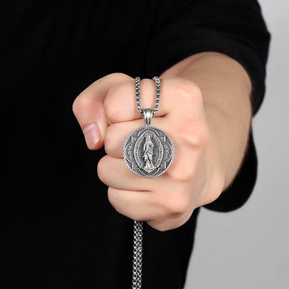 Origsoul Tranquil Spirit Collection Virgin Mary necklace held in hand with intricate pendant design