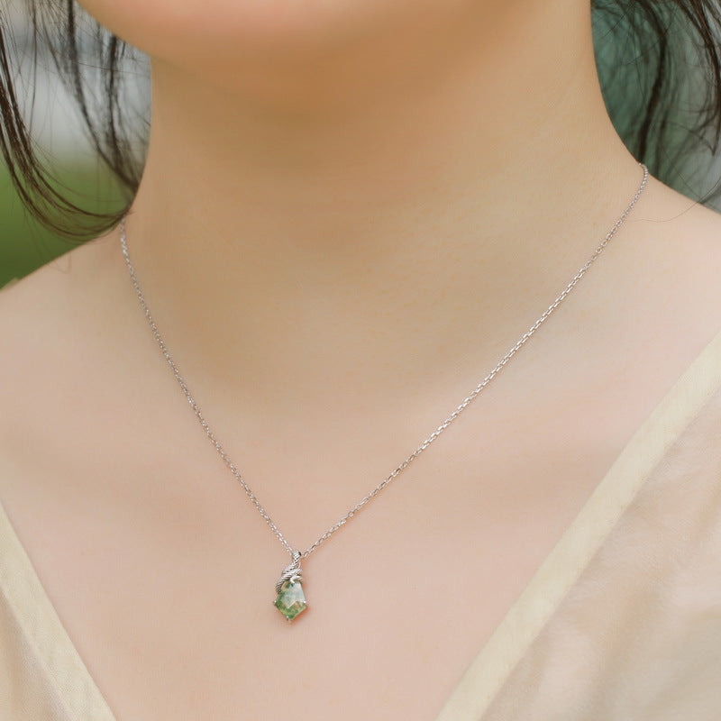 Origsoul delicate silver necklace with small green moss agate pendant on model's neck