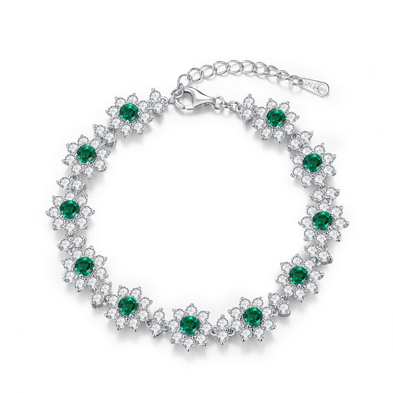 Origsoul sterling silver bracelet with green and clear gemstone floral design and adjustable clasp