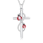 Sterling silver cross ladybug necklace featuring red enamel ladybugs and sparkling details