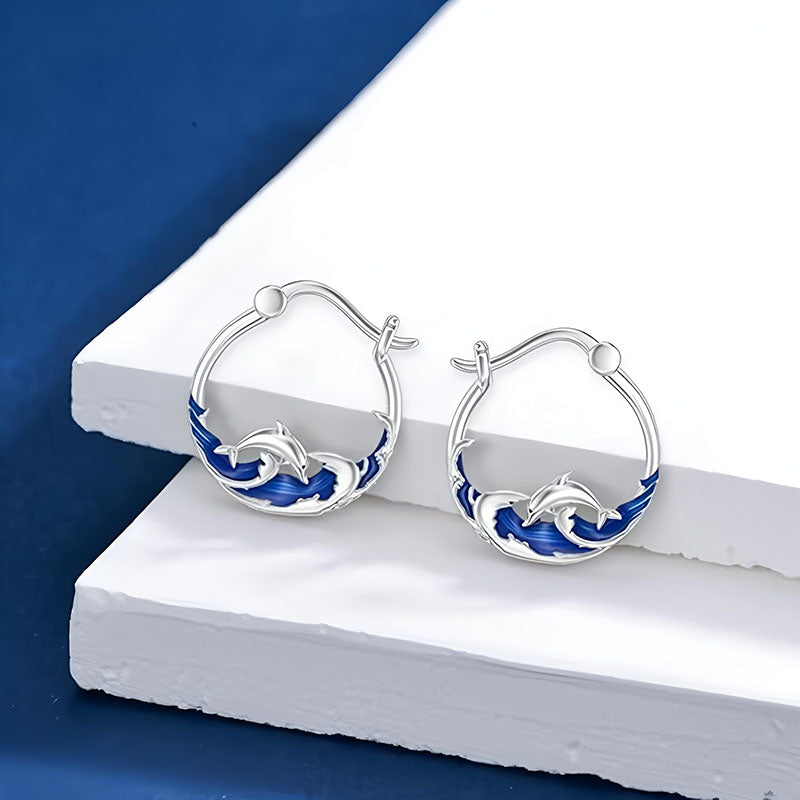 Origsoul sterling silver dolphin earrings with blue enamel detailing for ocean lovers