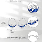 Origsoul sterling silver dolphin earrings featuring intricate design with blue accents