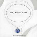 Sterling silver dolphin pendant necklace with blue enamel and sparkling accents, 17.72 to 19.69 inches in length