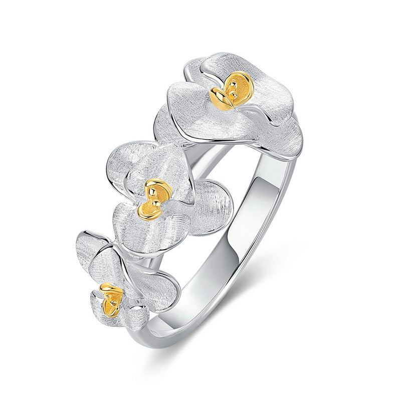Origsoul sterling silver earrings with intricate flower design and gold-tone detailing
